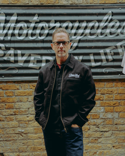 model wearing the black twill motorcycle jacket