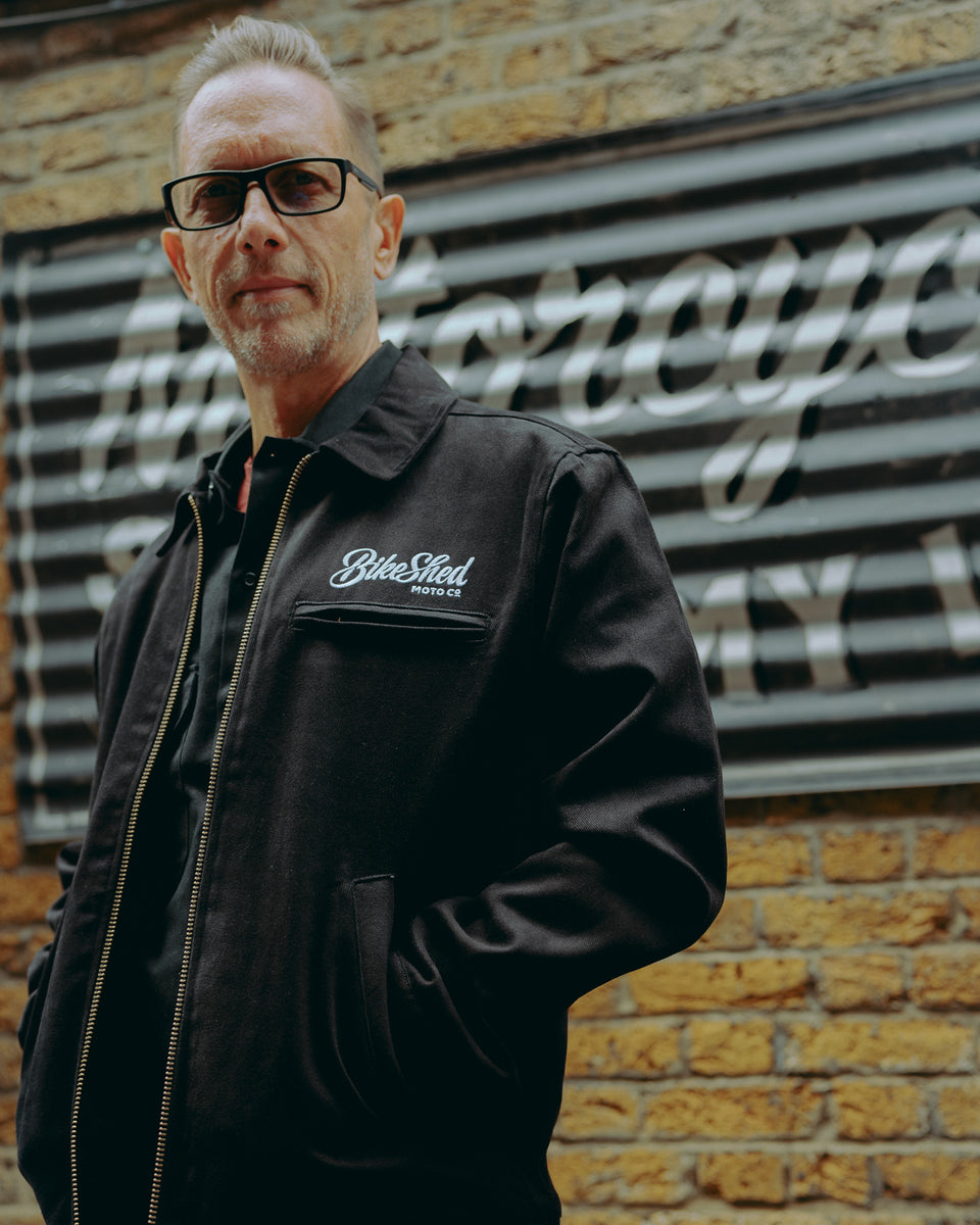 model wearing the black twill motorcycle jacket