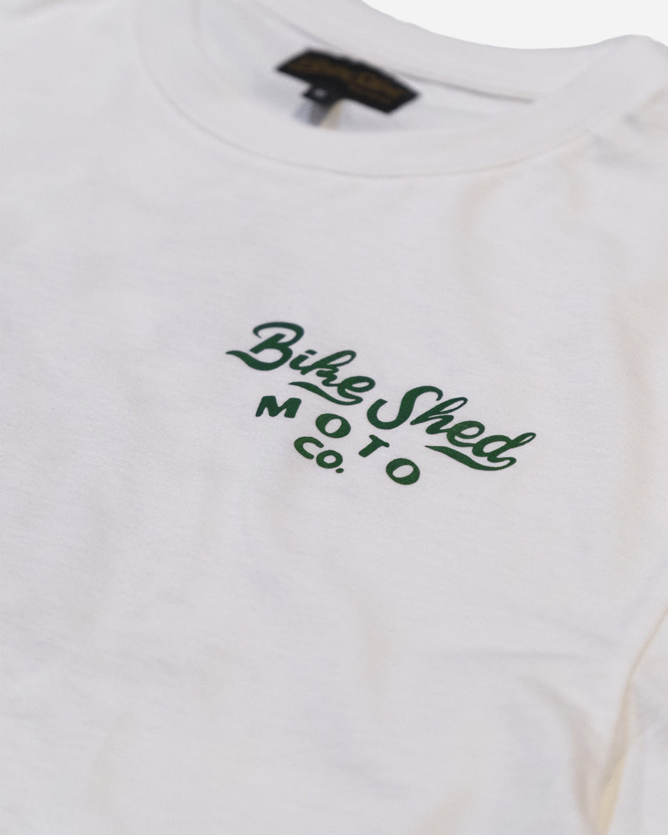 White shirt with 'Bike Shed Moto Co.' text in green on a white background