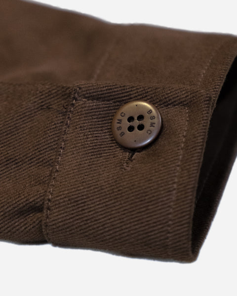 Close-up of a brown twill motorcycle jacket cuff