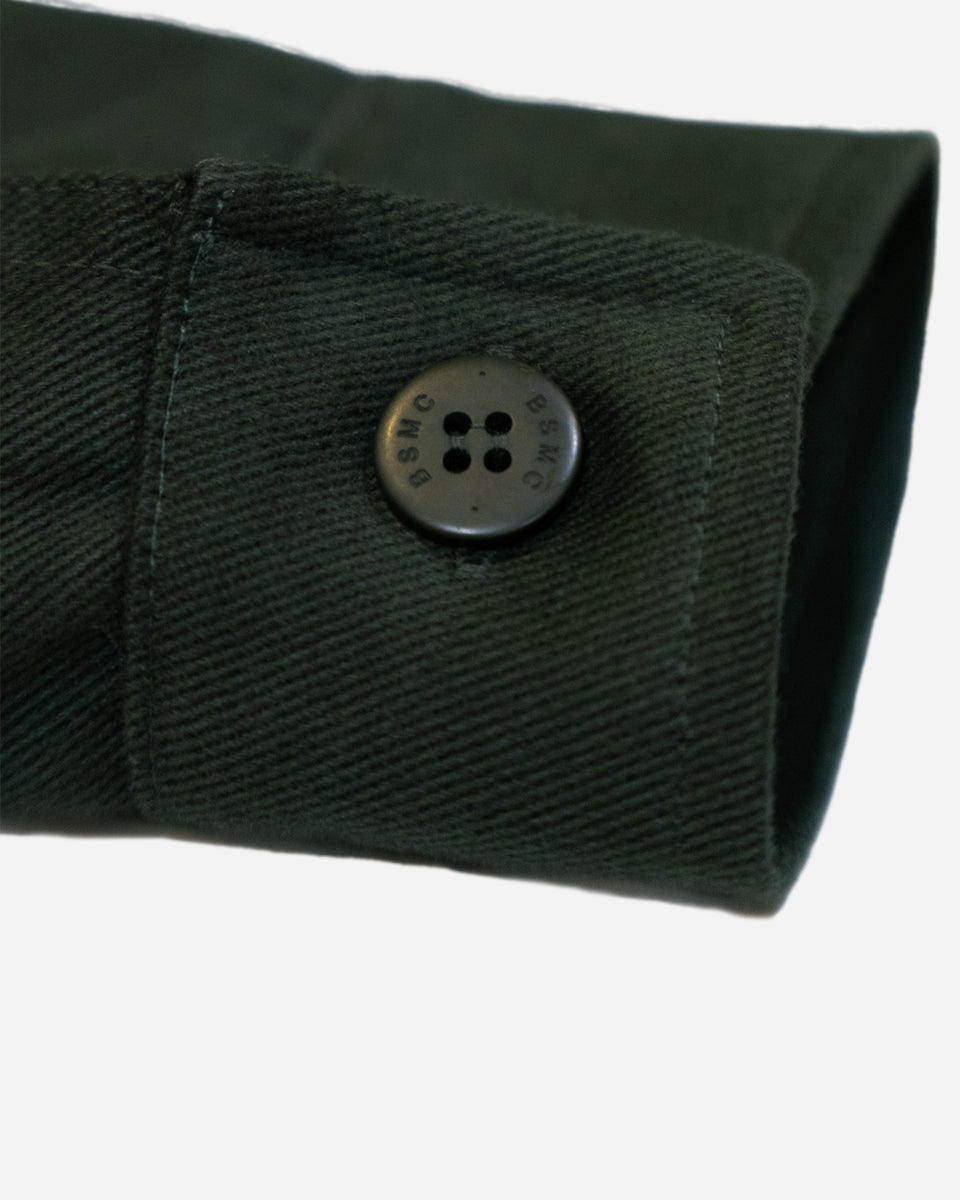Green motorcycle jacket cuff detail