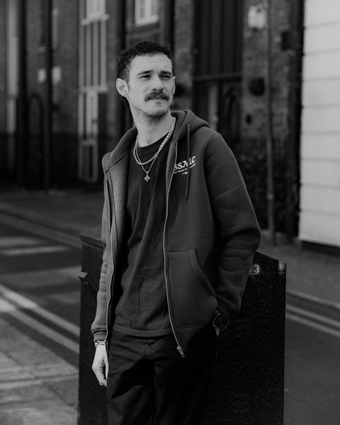 Model wearing Green Bike Shed Motorcycle Co. Good Times Hooded Sweatshirt 