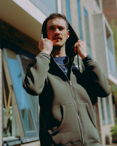 Model wearing Green Bike Shed Motorcycle Co. Good Times Hooded Sweatshirt 