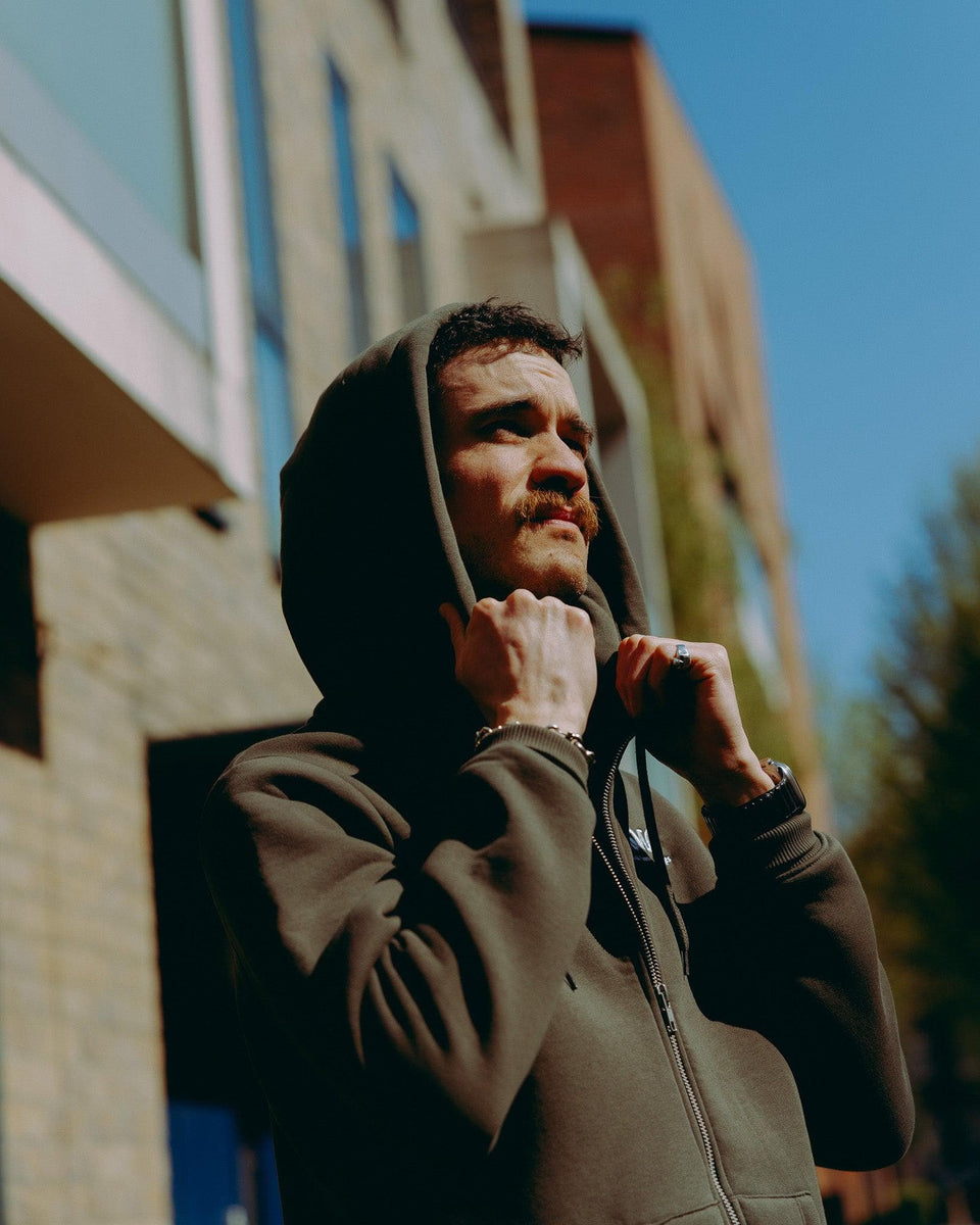 Model wearing Green Bike Shed Motorcycle Co. Good Times Hooded Sweatshirt 