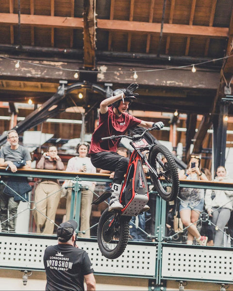 Model wearing burgundy Good Times Motorcycle Logo T-Shirt